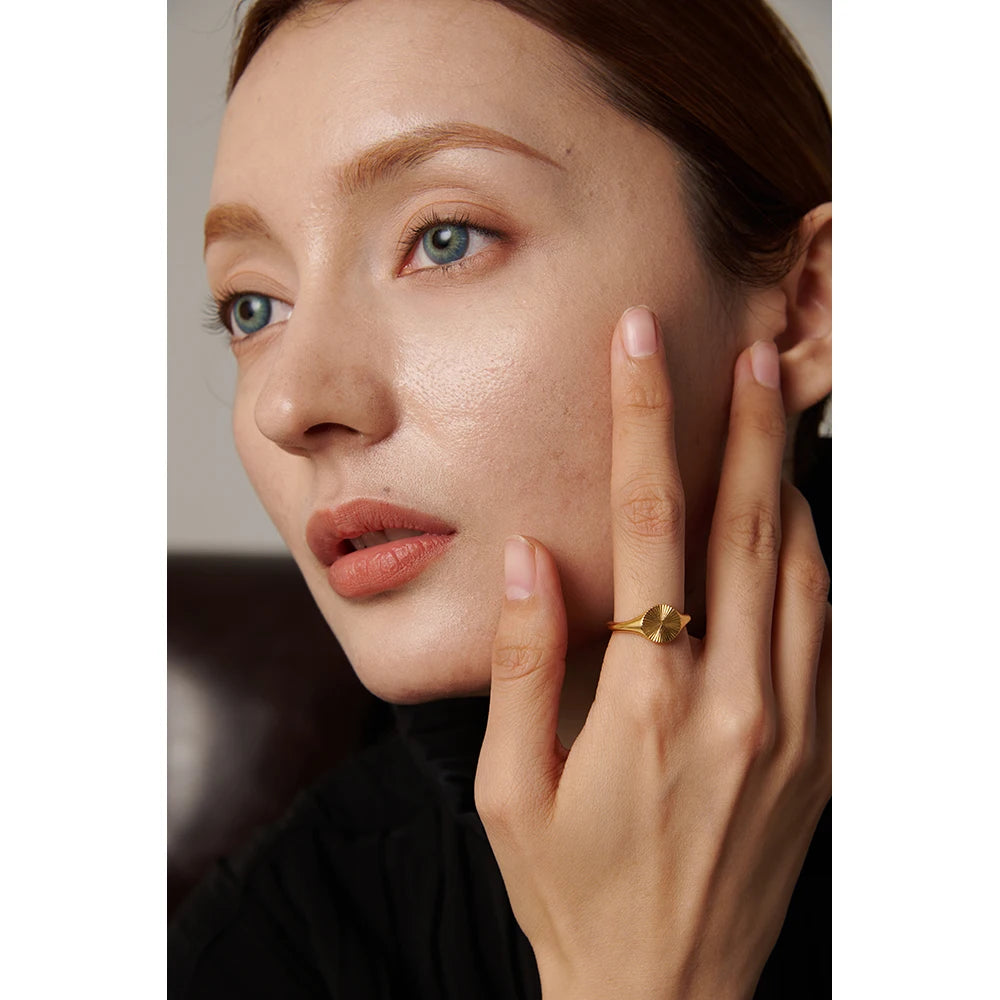 Radiant Sunburst Geometric Ring